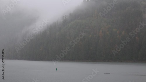 Heavy rainfall low clouds over lake