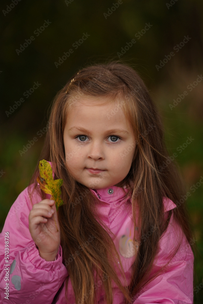 Young girl walking outdoors on the playground in a retro style Young girl walking outdoors on the playground in a retro style