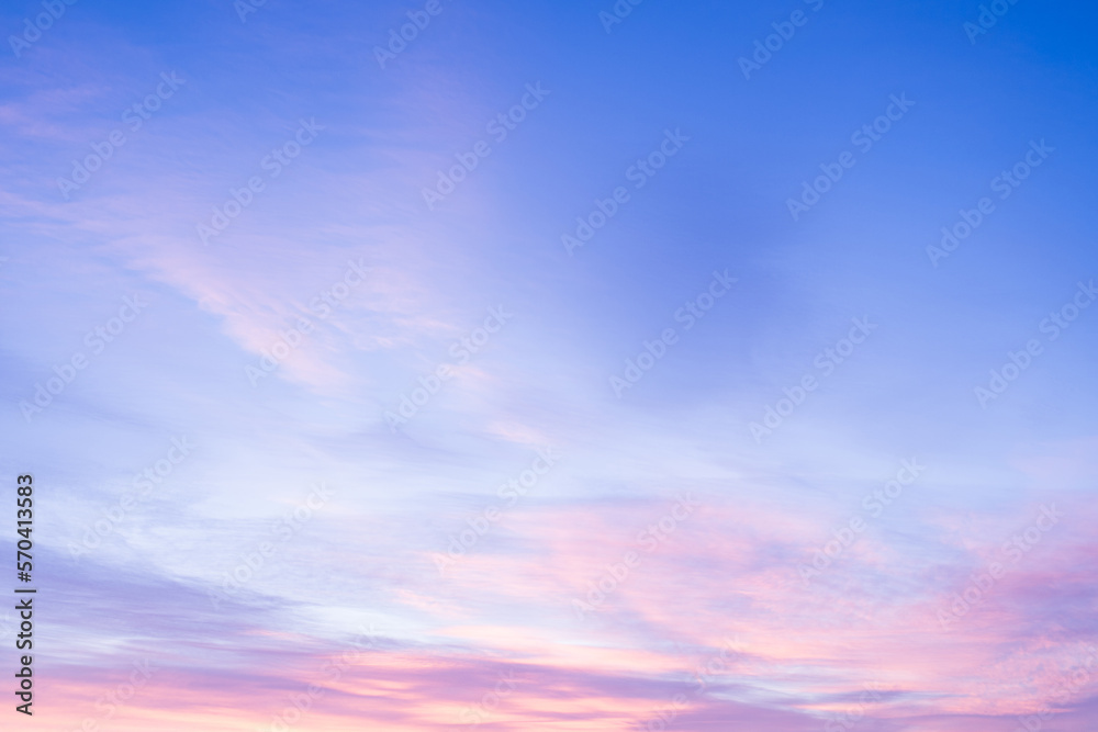 Sky with soft and fluffy pastel pink and blue colored clouds. Sunset background. Nature. sunrise. Instagram toned style