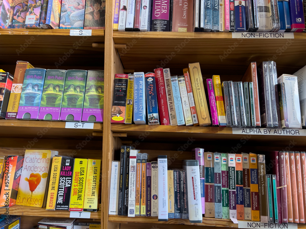 Fototapeta premium Redmond, WA USA - circa December 2022: Close up view of used audiobooks for sale inside a Half Price Bookstore.