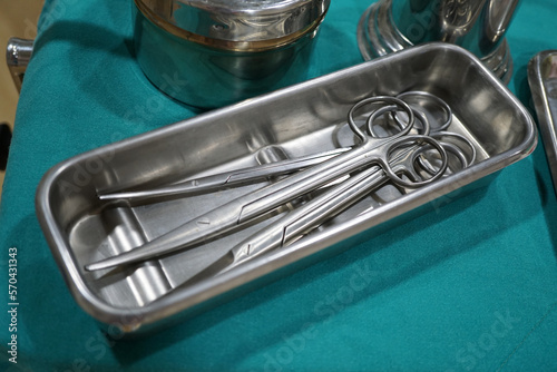 Close up of scissors prepare for surgical instruments during operation, scissors, forceps and scalpels,Straight scissor for used to cut suture material where as curve scissor for tissue. 