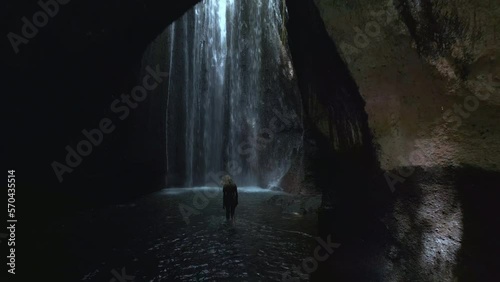 Amazing waterfall in a cave on Bali. Aerial view. 