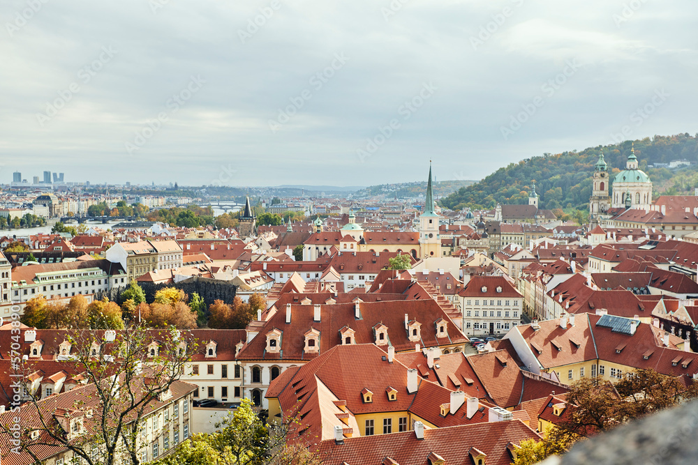 Cityscape of old Prague with roofs during autumn.