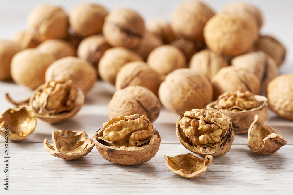 walnuts on a white kitchen table, selective focus. walnuts on a white kitchen table, selective focus.
