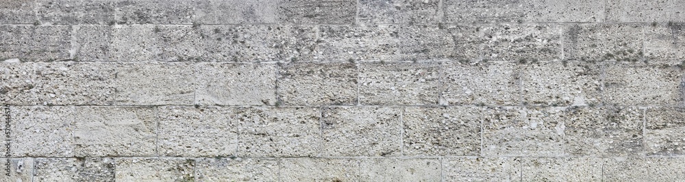 Beautiful old castle wall made of natural stone Beautiful old castle wall made of natural stone