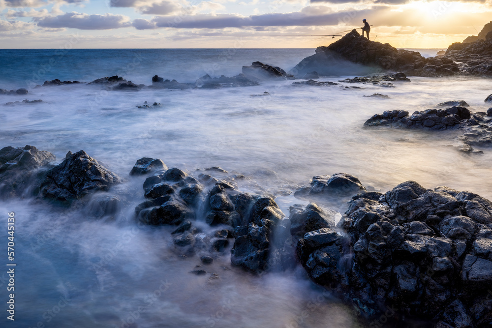 Fototapeta premium Magic sunrise at Punta de Silva with waves hitting the rocks.