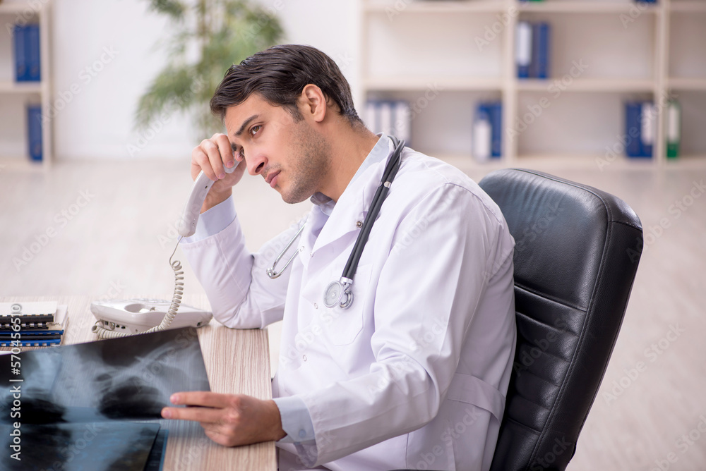 Young doctor radiologist in telemedicine concept Young doctor radiologist in telemedicine concept