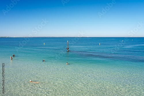 People swimming and snorkelling the Omeo Wreck on Coogee Beach in Fremantle, Western Australia