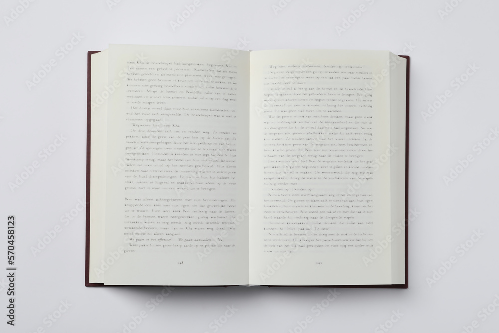 Obraz premium Open book on white background, top view