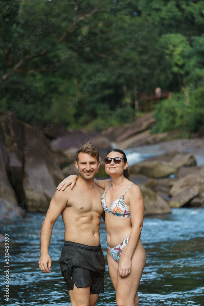 Fototapeta premium portrait of a fit couple enjoying the day at the river in australia