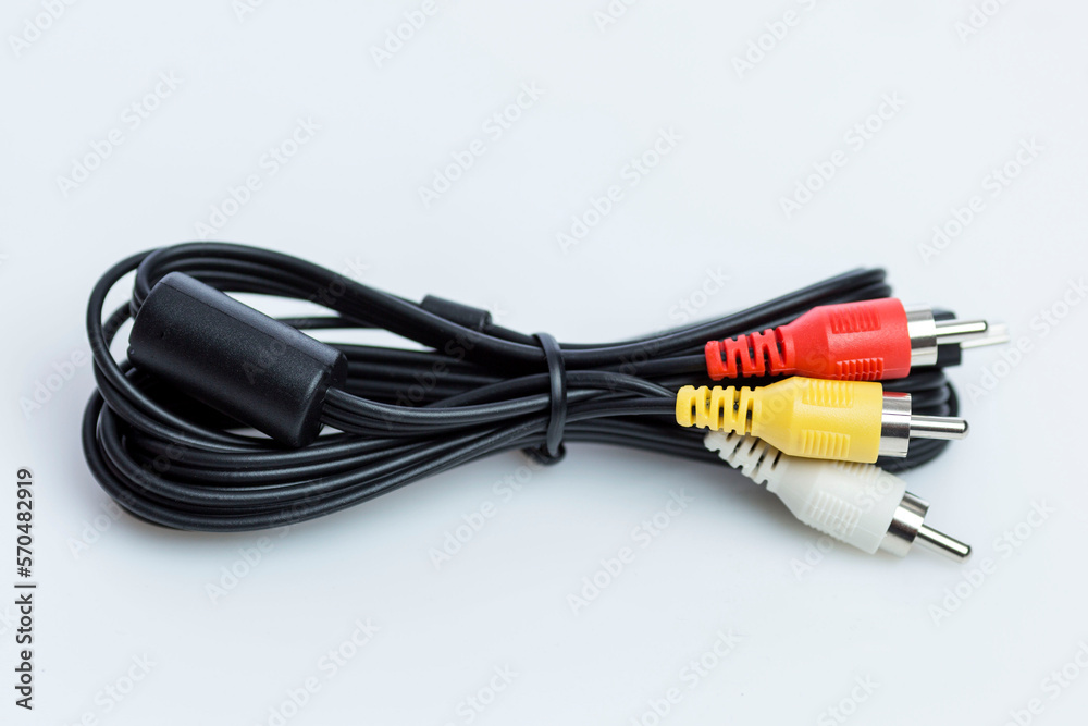 Cable with connectors for photo and video cameras. Close-up. White background. Cable with connectors for photo and video cameras. Close-up. White background.