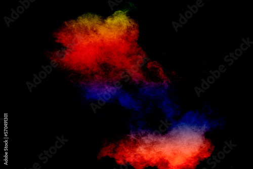 Colorful background of pastel powder explosion.Multi colored dust splash on black background.