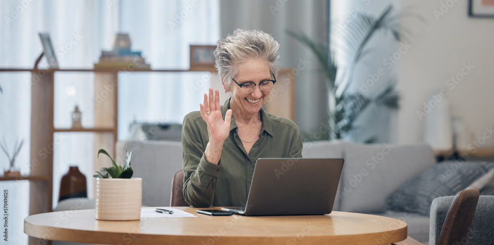 Laptop, video call and remote work with a senior woman at work in her home office for business communication. Computer, virtual meeting and planning with a mature female employee waving at her webcam Laptop, video call and remote work with a senior woman at work in her home office for business communication. Computer, virtual meeting and planning with a mature female employee waving at her webcam