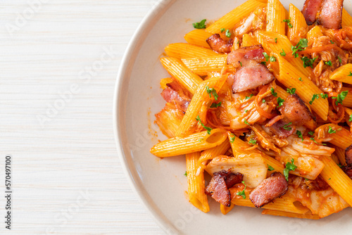 stir-fried penne pasta with kimchi and bacon