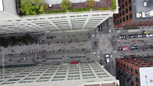 a aerial view drone shot of a street in the area of the dumbo in brooklyn, in the new york city with the people walking and roofs with gardens nyc photo