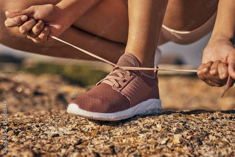 Fitness, hands and tie shoes in nature to start running, workout or training. Sports, wellness and female or woman tying sneaker laces or footwear to get ready for exercising, cardio or jog outdoors. - obrazy, fototapety, plakaty 