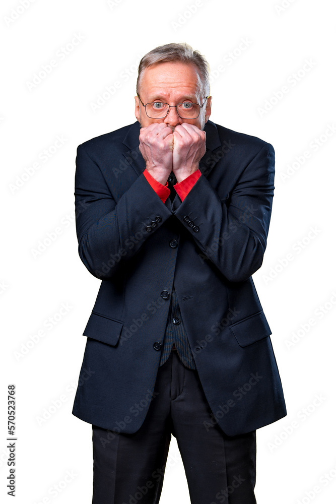 Emotional man in a business suit holds hands near the face. Excited. Human emotions Emotional man in a business suit holds hands near the face. Excited. Human emotions