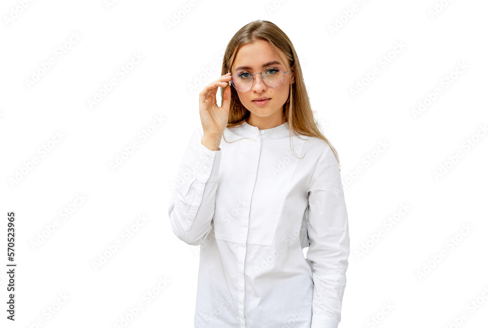 Female client or optician is standing with raw of glasses in background. Optical shop. Stand with spectacles. Eyesight correction. Girl in glasses is posing to the camera. Female client or optician is standing with raw of glasses in background. Optical shop. Stand with spectacles. Eyesight correction. Girl in glasses is posing to the camera.