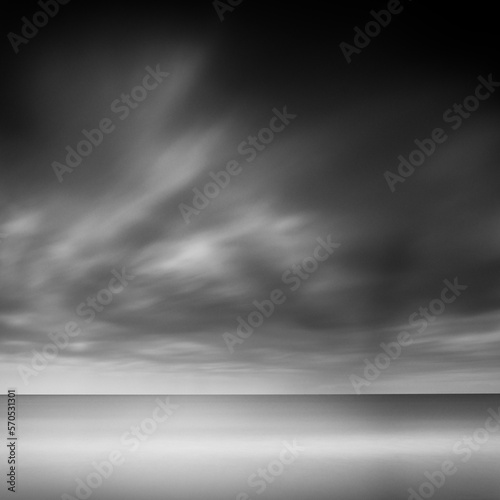 Long exposure shot of the sea and moody clouds in Kugenuma, Kanagawa Prefecture, Japan photo