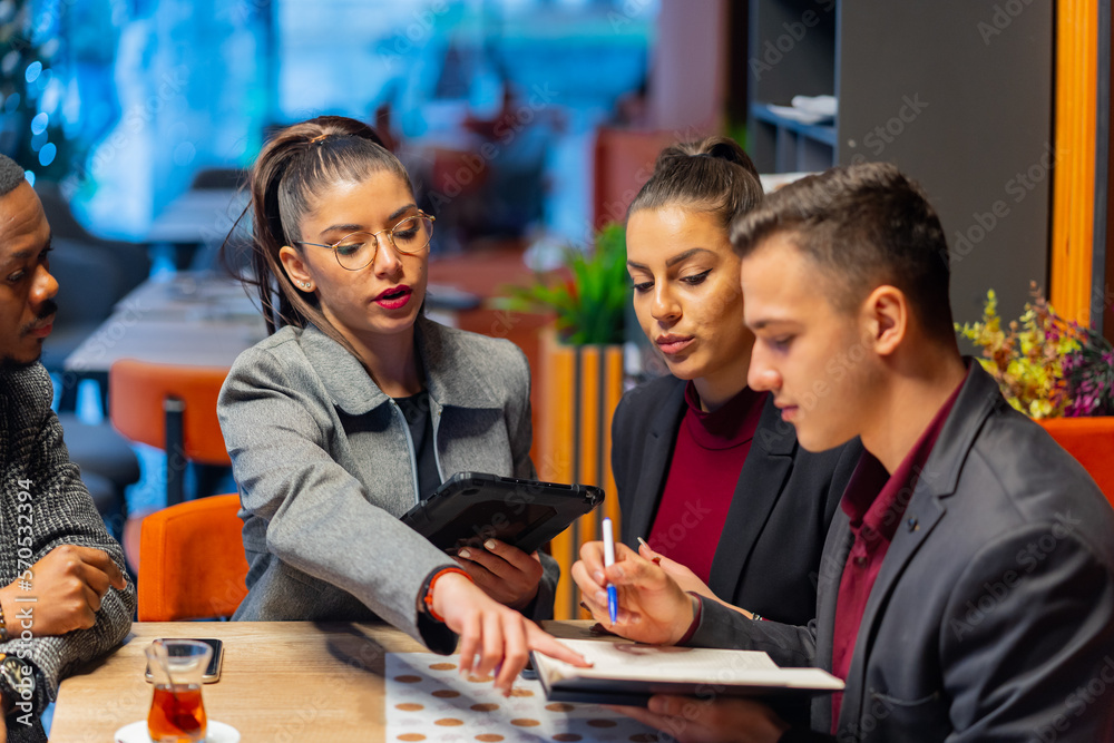 Talking about the company plans and ideas while sitting in the cafe
