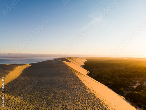 Sunrise on Dune du Pilat with pine forest panoramic view on the atlantic ocean in Bassin D'arcachon Landes Aquitaine France  photo