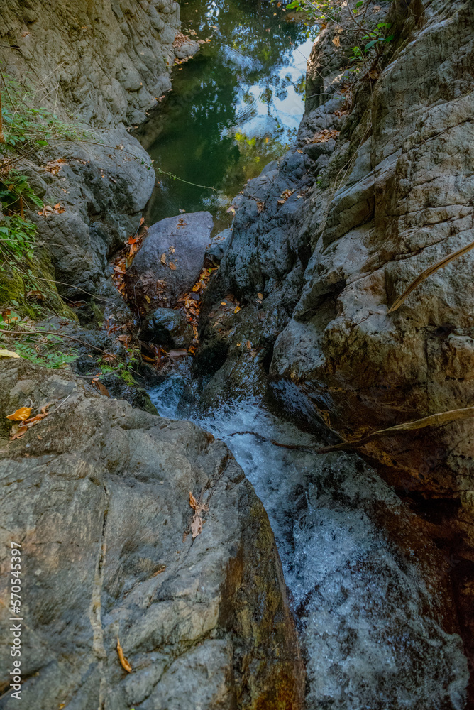 Obraz premium Waterfall in the deep forest on the top of the mountain.