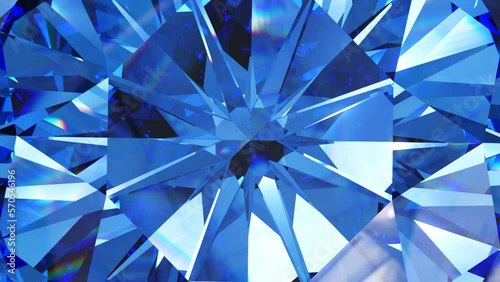 Beautiful shiny sapphire crystal. Kaleidoscope, rotating background, looping animation photo