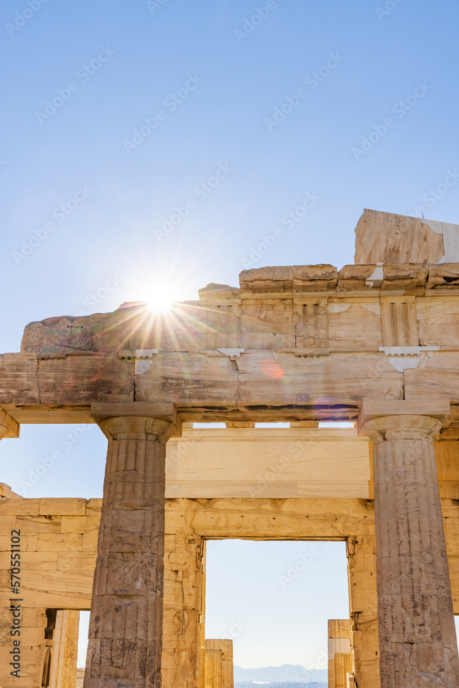 Fototapeta premium Ancient column at Acropolis site on a sunny evening in Athens Greece