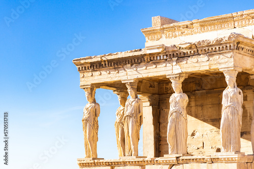 Porch of the Caryatids at temple of Athena Pollias or the Erechtheion at Acropolis site on a sunny evening in Athens Greece