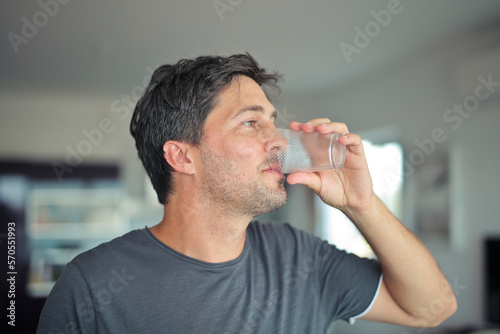 portrait of man while drinking water