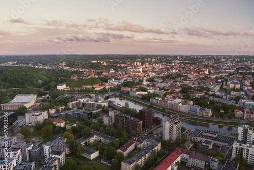 Beautiful Vilnius city panorama in early spring. Aerial sunrise view.
