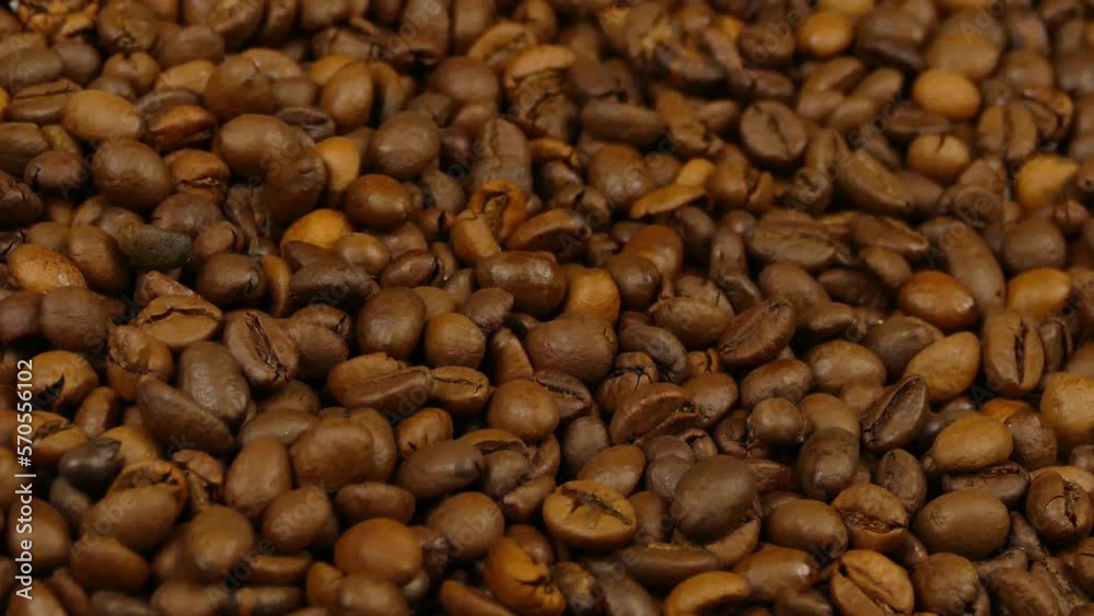 roasted coffee beans scattered roasted coffee beans scattered