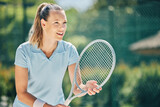Woman, tennis player and racket ready in sports game for ball, match or hobby with smile on court. Happy female in sport fitness holding racquet in stance for training or practice in the outdoors