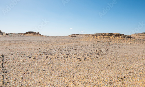 Barren desert landscape in hot climate with rocky scenery