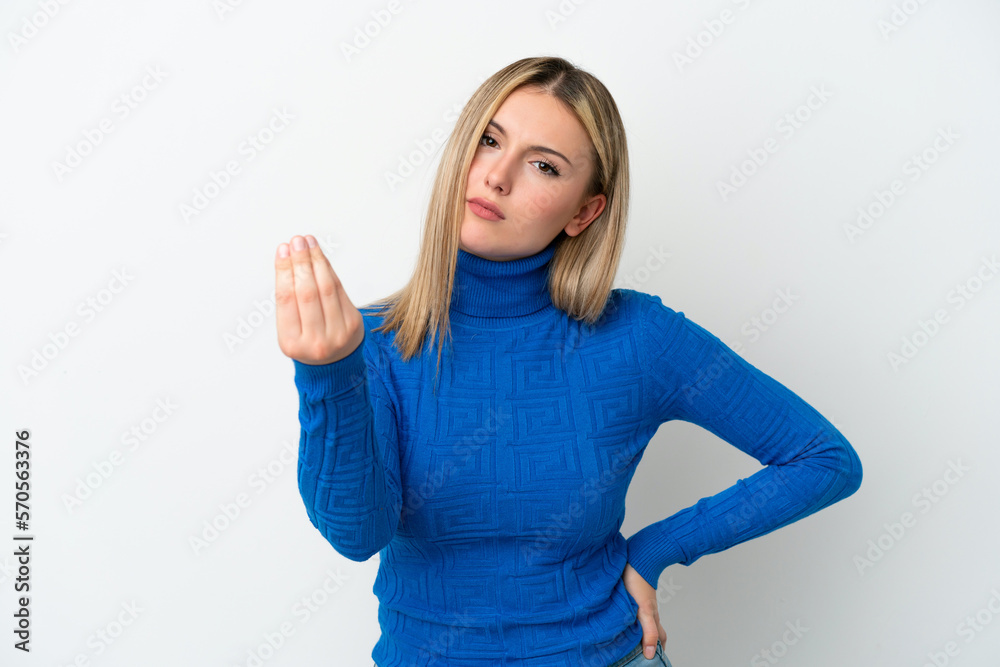 Young caucasian woman isolated on white background making Italian gesture