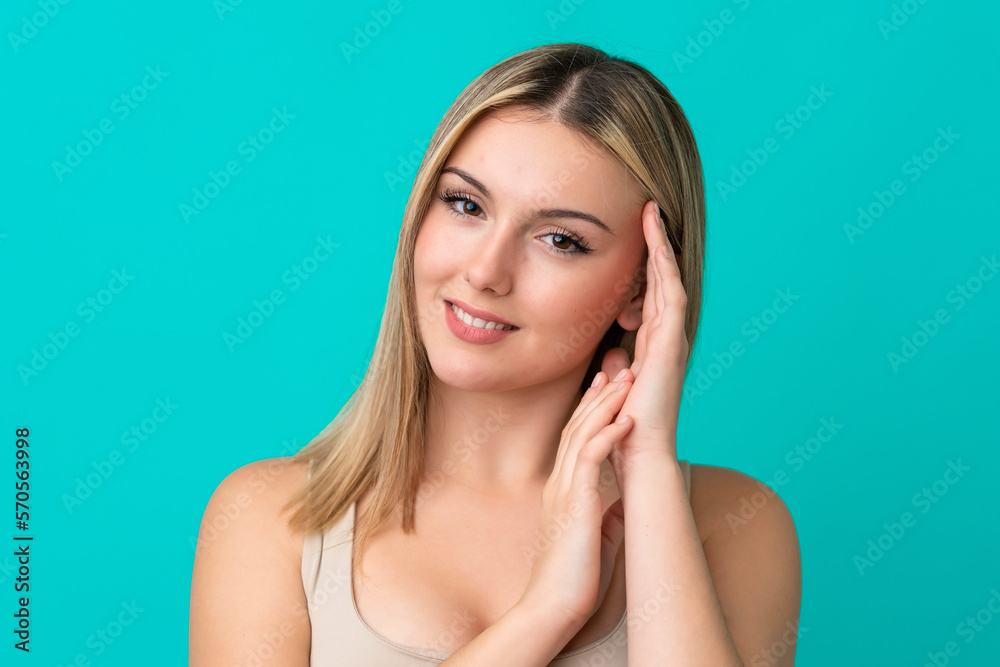 Portrait of pretty young woman over blue isolated background Portrait of pretty young woman over blue isolated background