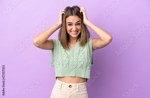 Young caucasian woman isolated on purple background doing nervous gesture