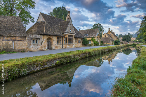 A colourful sky above the village of Lower Slaughter in the Cotswolds, Gloucestershire., England.