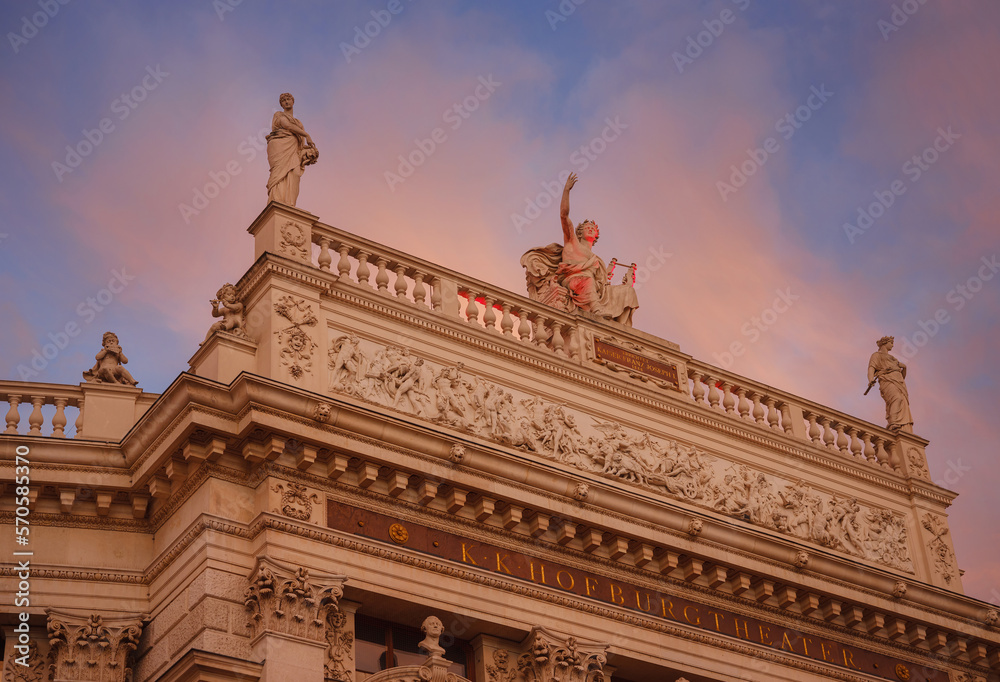 Obraz premium The Burgtheater is court theater in Vienna Hofburg. one of oldest theaters not only in Austria, but throughout Europe. over sunset sky