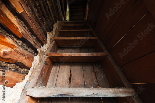 Abstract grungy interior, perspective view of a stairway going up © evannovostro