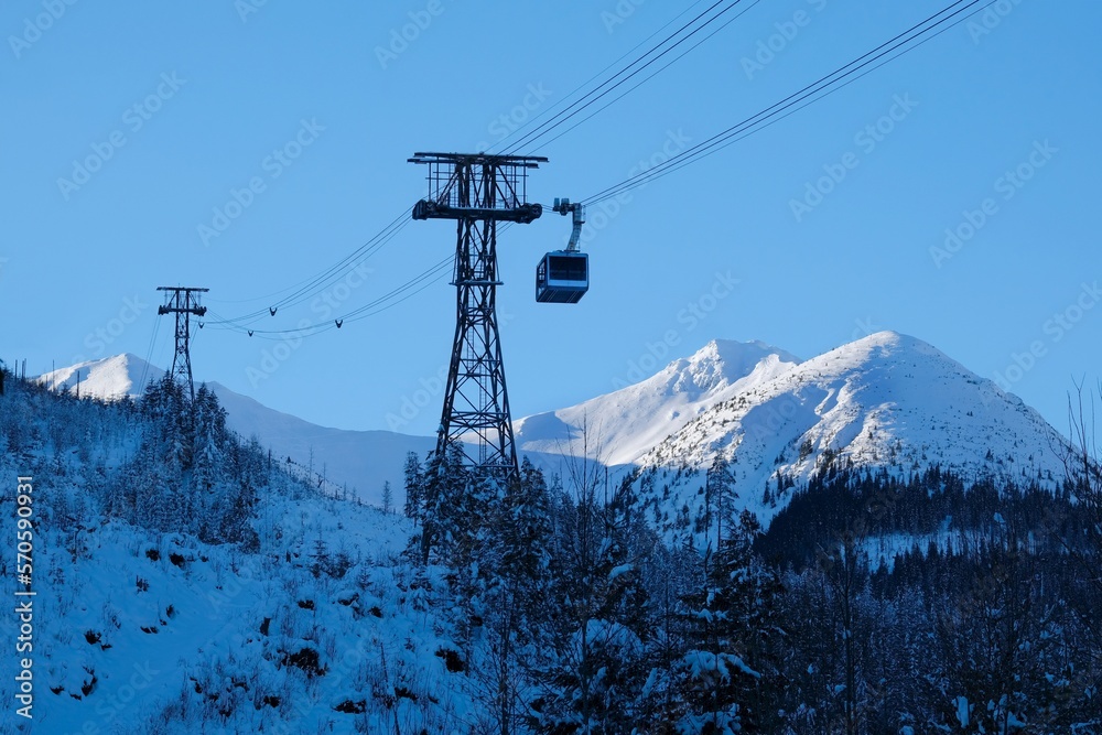 Ropeway to Kasprowy Wierch Peak in Tatras Mountains in beautiful winter scenery in morning light, famous place in Tatras, Poland. Tatra National Park