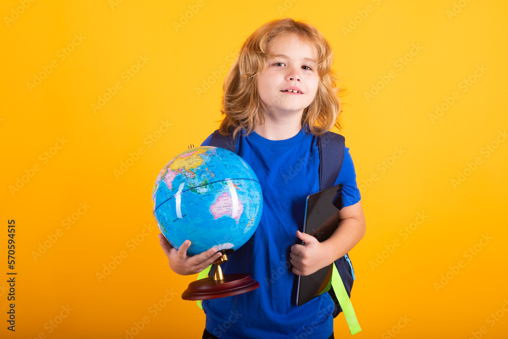 Fototapeta premium School boy world globe and tablet. Smart caucasian school boy kid pupil student going back to school. Education kids.