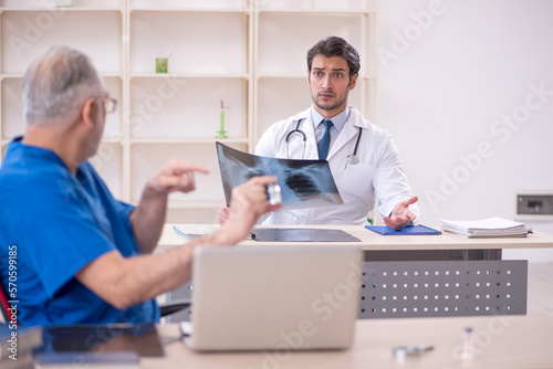 Two male doctors radiologists working in the clinic
