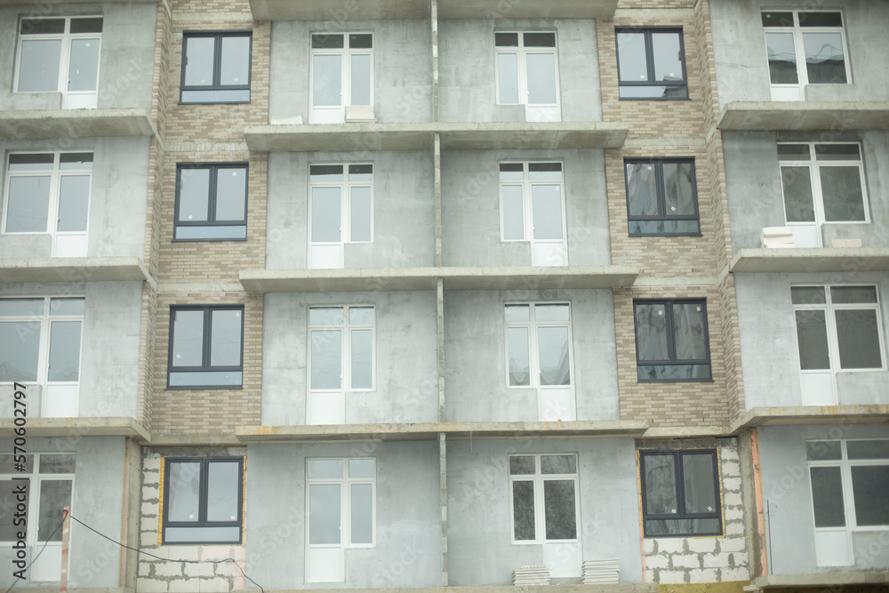 Fototapeta premium Construction of house. Concrete panel. Creation of balconies.