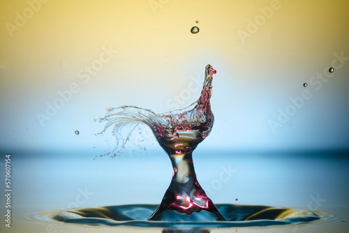 Water drop falling and colliding with another one	