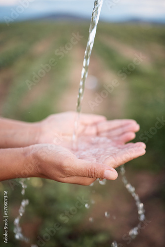 Hands, splash and washing or cleaning with water, hydration and freshness for sustainability outdoors on a farm. Person, ecology and aqua to prevent germs or bacteria for care, wellness and health