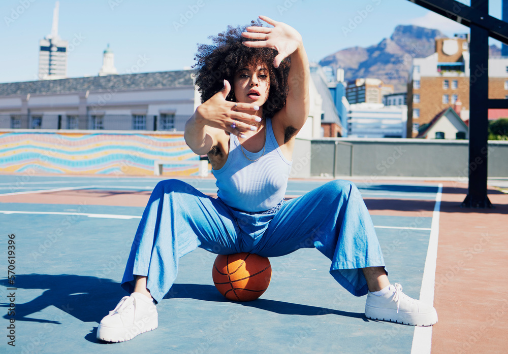 Basketball court, fashion and frame of hands of black woman urban style, feminist and armpit hair in city. Sports, fitness and portrait of girl with ball in stylish, confident and trendy clothes