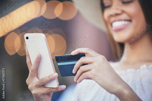 Obraz na plátne Woman, hands and phone with credit card for ecommerce, purchase or online shopping in city