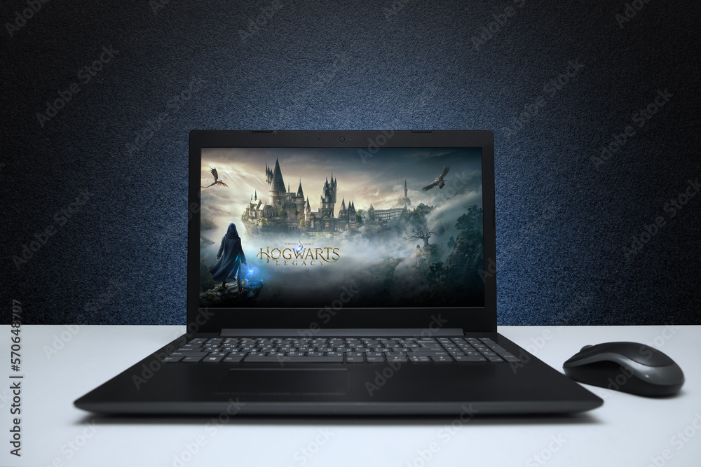 Fototapeta premium The Hogwarts Legacy computer game logo on laptop screen. Hogwarts Legacy be available in PC. Moscow, Russia - February 10, 2023.