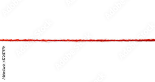 Red thread isolate on white background. Selective focus. Old. Fototapeta
